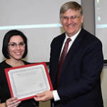 Paula Castillo is receiving from Dr. Ragsdale, Dept. Head, the “Outstanding Master of Science Entomology student award“